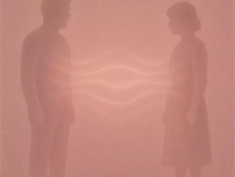 Emotional space remaining between two people after a breakup, symbolizing unresolved connection and emotional awareness without force or control.